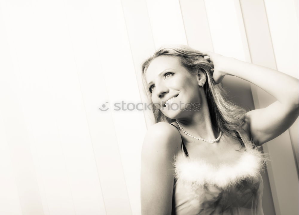 young blonde woman laughs