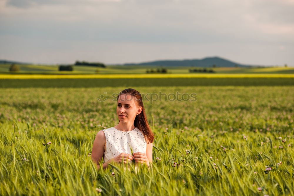 Image, Stock Photo Girl with camera smiling in fields