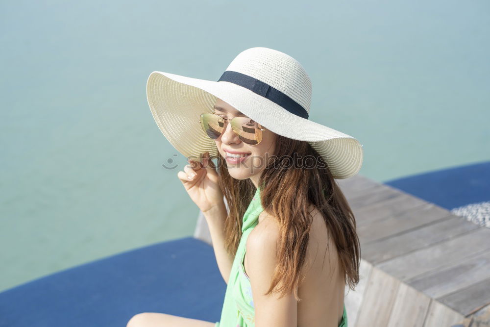 Similar – Image, Stock Photo Woman making peace sign standing in swimming pool