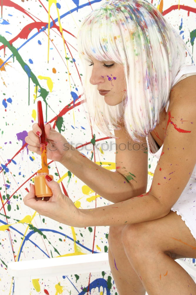 Similar – Young cute woman with paint in her face