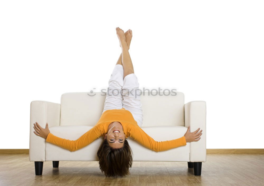 Image, Stock Photo Feet up. Casual young woman sits barefoot on a comfortable armchair, relaxes, raises her legs. vertical.