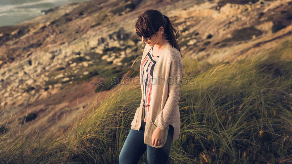 Similar – Young woman in almond flowered field in spring time