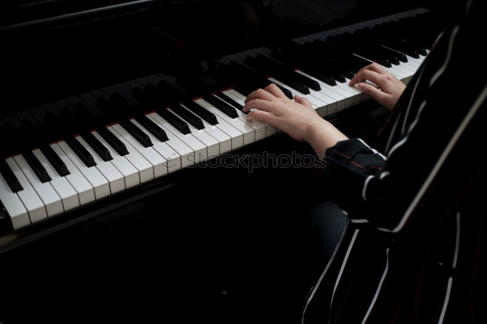 Similar – Image, Stock Photo Concert grand piano on parquet floor with keys and pedals in partial view oblique from above with shallow depth of field