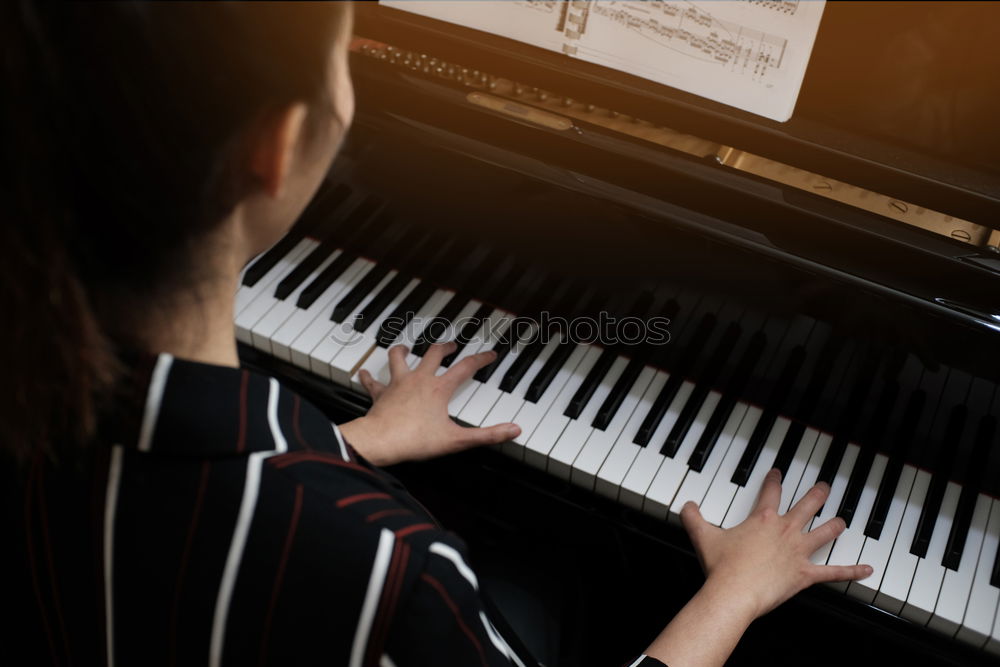 Similar – Image, Stock Photo young woman holding playing piano at home