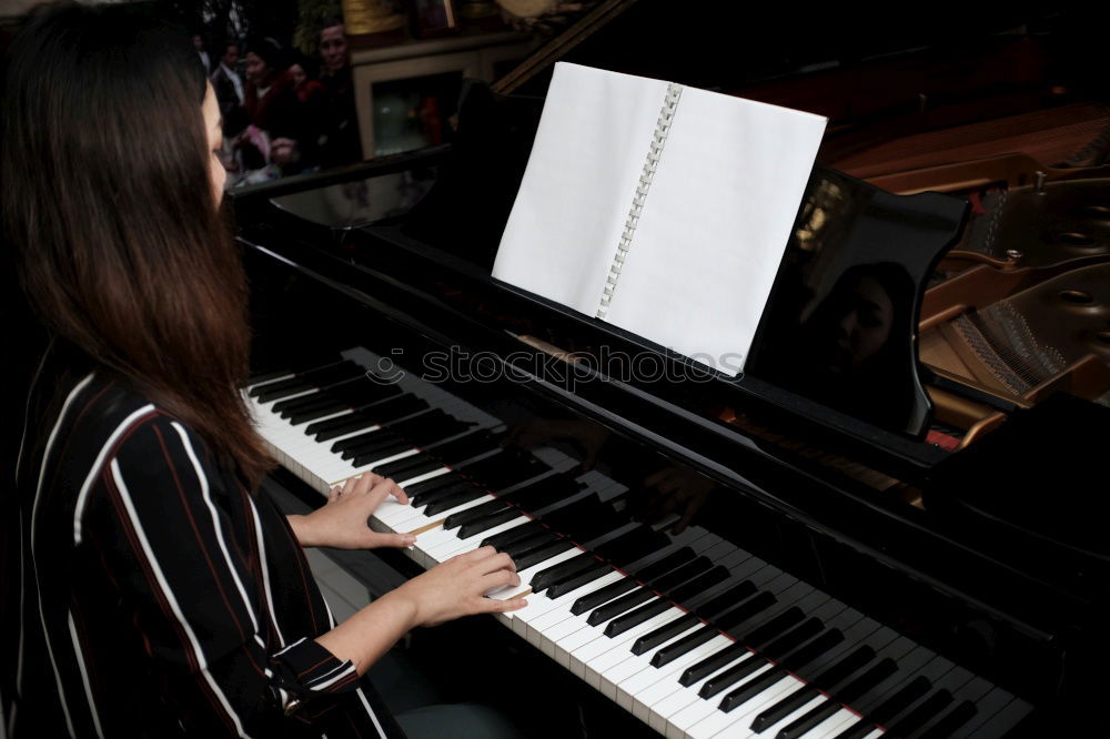 Similar – Image, Stock Photo young woman holding playing piano at home