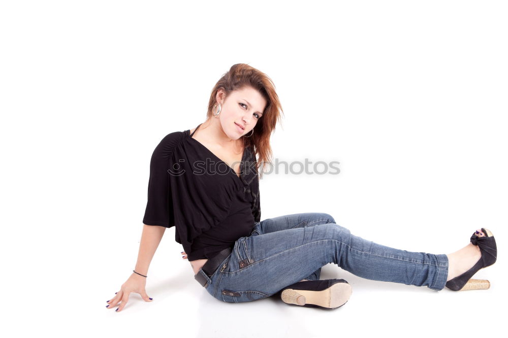 Similar – Elegant businesswoman looking at camera while sitting on stairs against of white wall