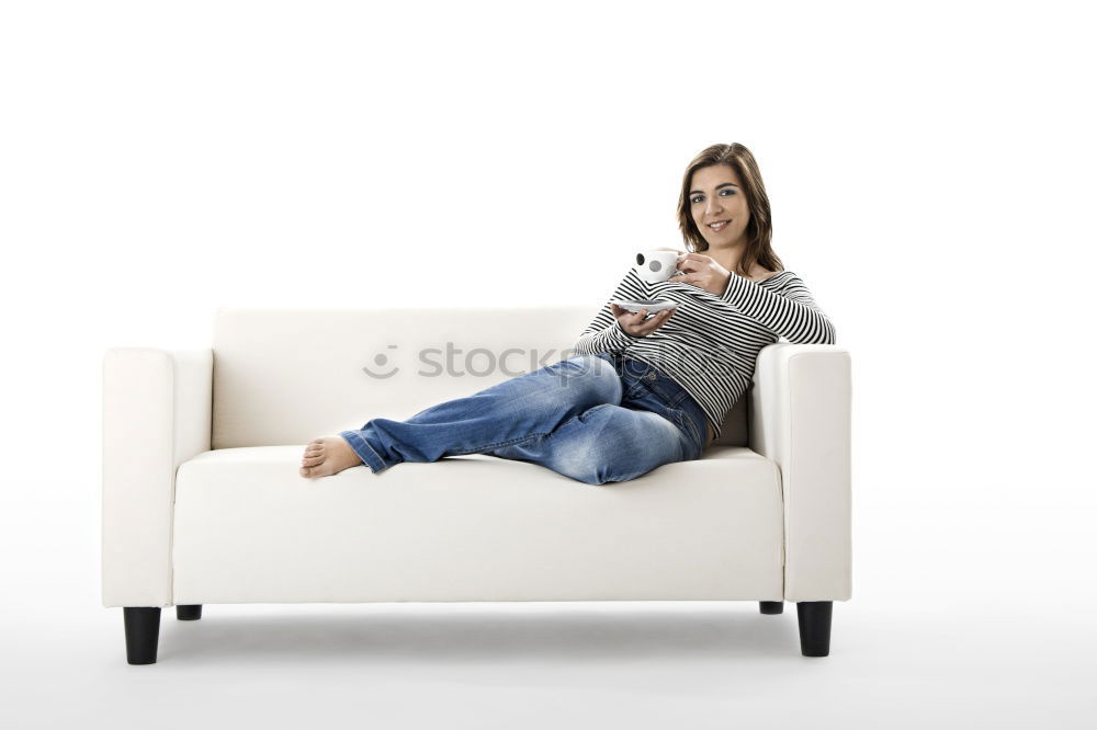 Similar – young, tall, leggy woman sits barefoot on a light couch