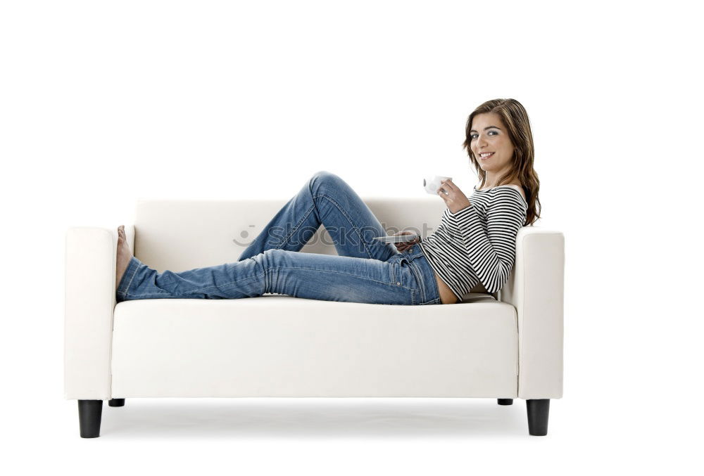 Similar – young, tall, leggy woman sits barefoot on a light couch