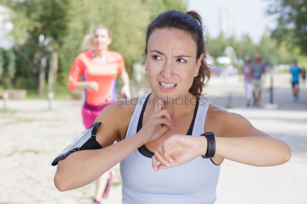 Similar – Athletic Women Drinking Water After an Exercise