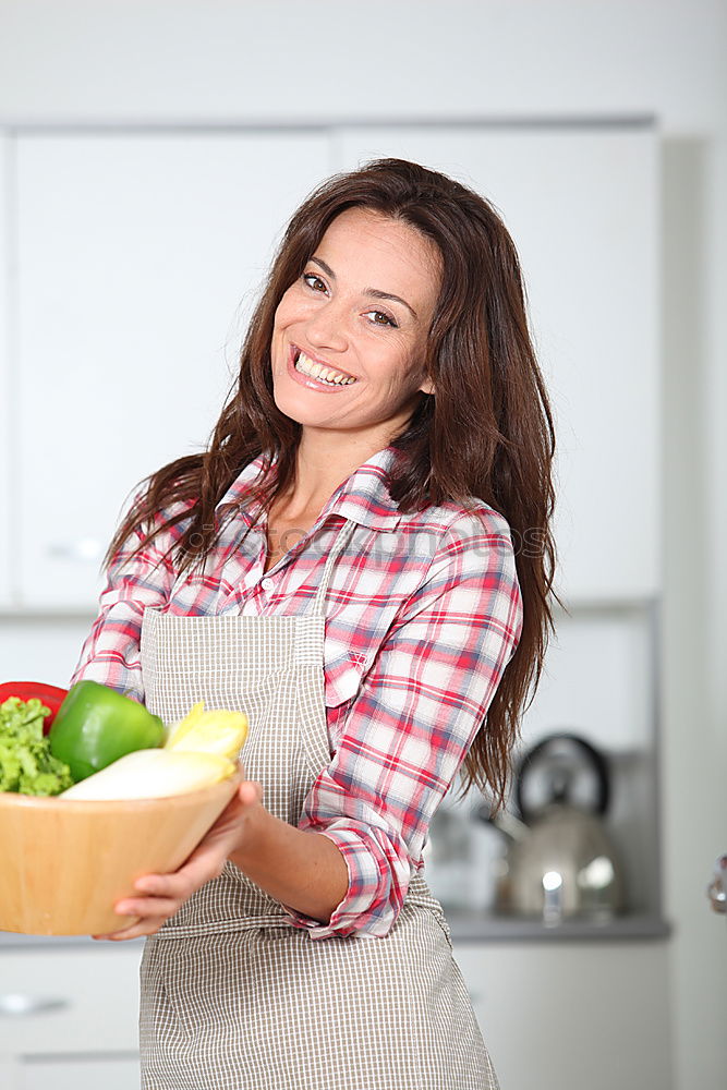 Similar – Young couple cooking. Man and woman in their kitchen