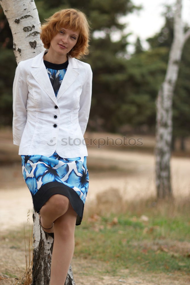 Similar – Image, Stock Photo Red haired woman enjoing of the a sunny day