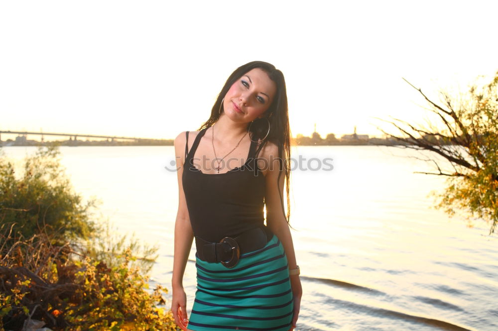 Similar – Young woman standing in the river Rhine