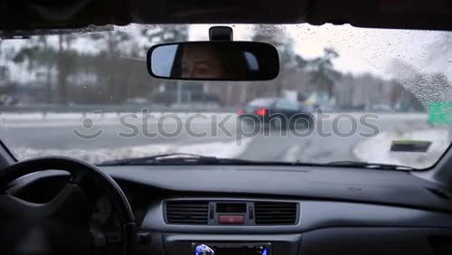 Similar – Person driving in snowy day