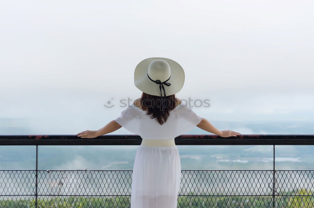 Similar – Image, Stock Photo Girl with hat in the cable car.