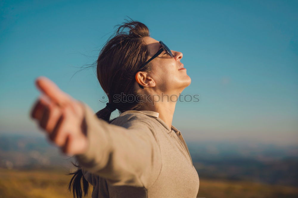 Similar – Image, Stock Photo A women with a bottle in her hand looks at the landscape