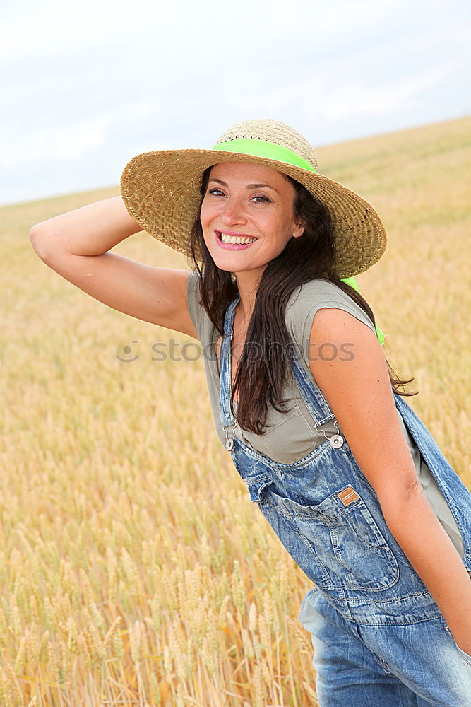 Similar – Image, Stock Photo Young cowgirl in a field of cereals