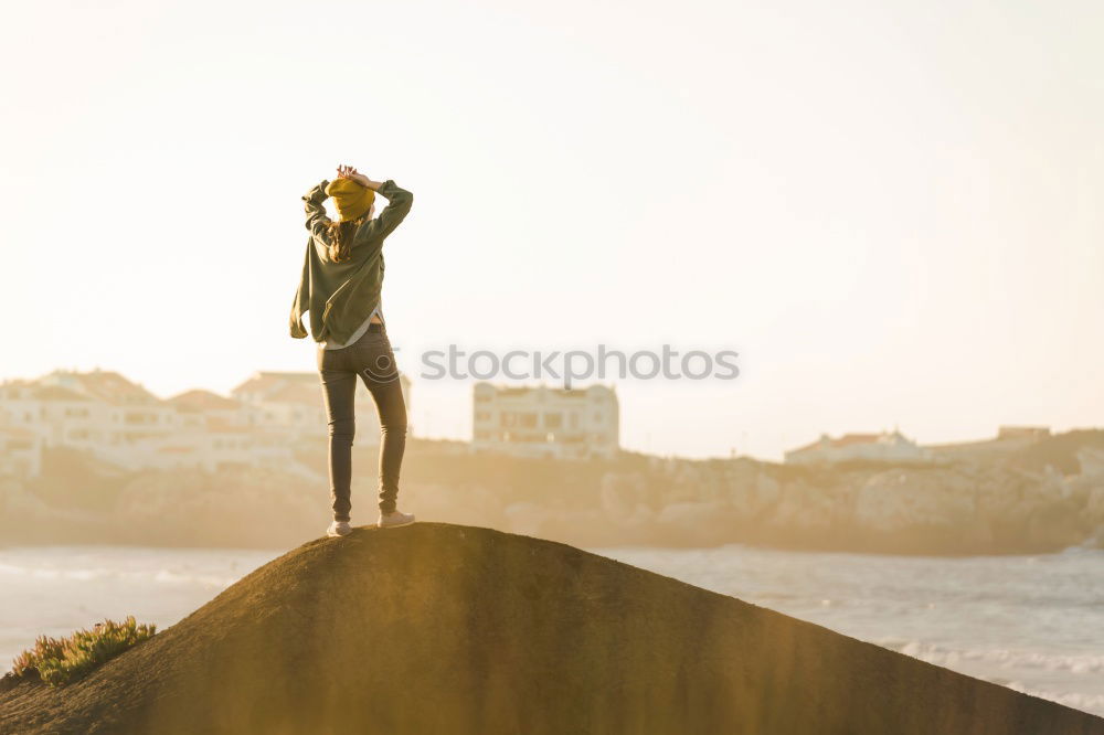 Similar – female runner jumping for joy