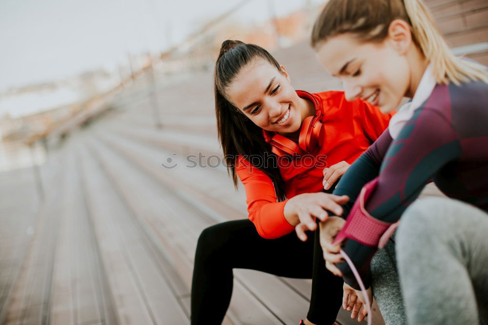 Similar – Happy friends sitting on steps