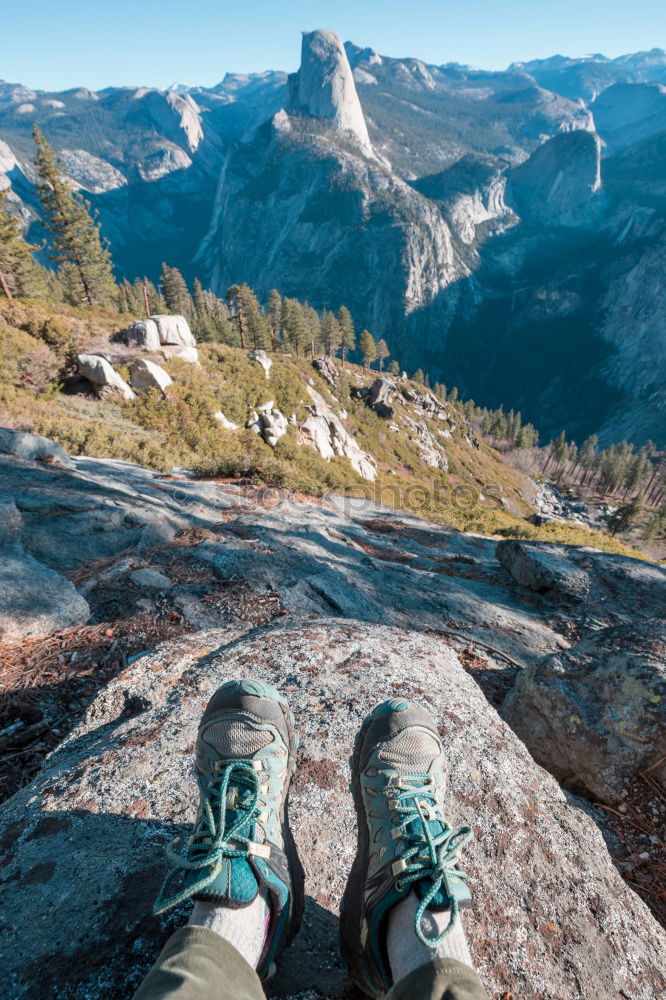 Similar – Image, Stock Photo Climbing sport: young boy takes a rest observing panorama