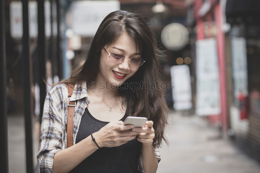 Similar – Image, Stock Photo Pretty Asian woman touching lamp