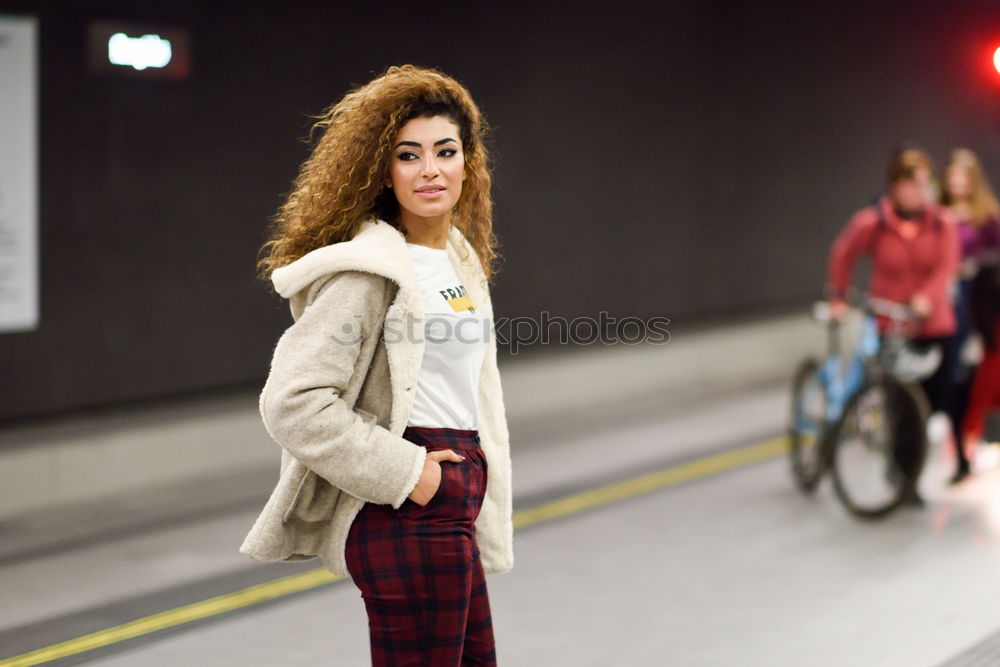 Image, Stock Photo Young woman waiting her train in a subway station