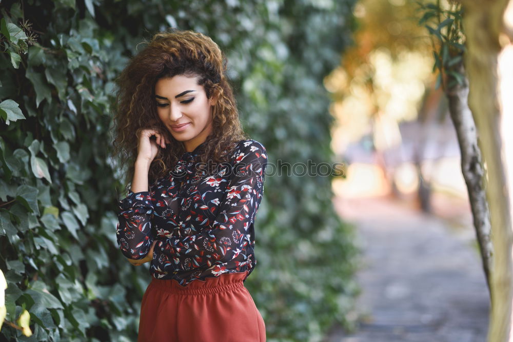 Similar – Image, Stock Photo African woman with black curly hairstyle outdoors.