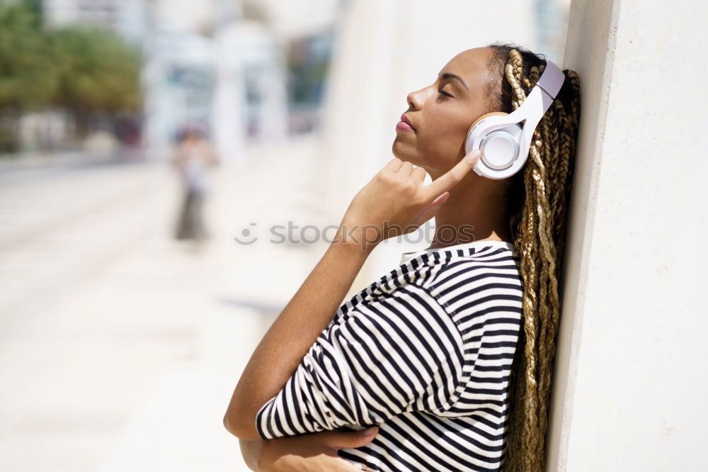 Similar – Image, Stock Photo Black woman listening to the music with headphones