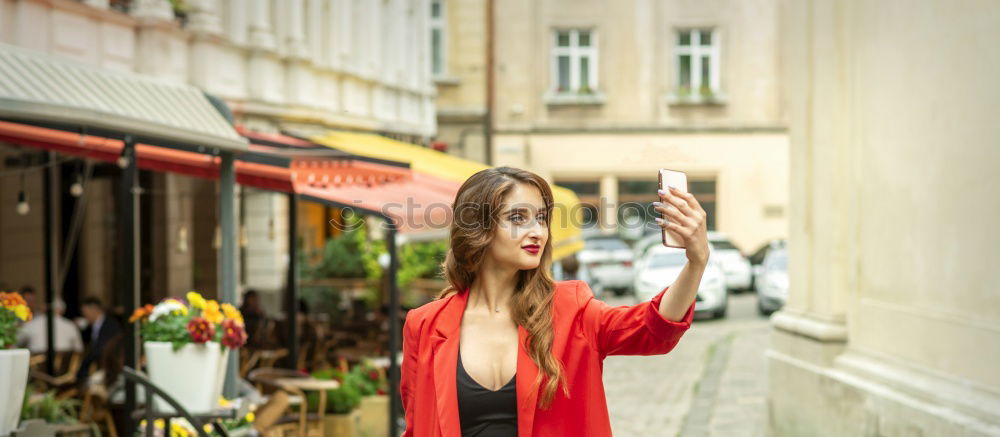 Similar – Cheerful friends taking photos of themselves on smart phone