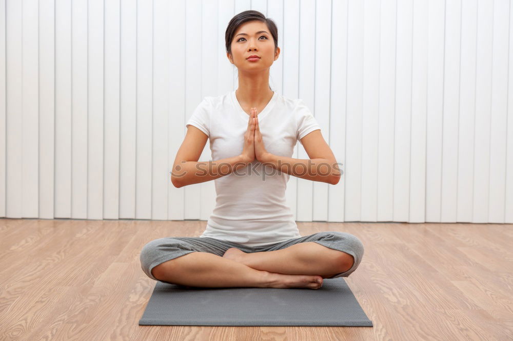 Similar – Teen girl doing yoga at home