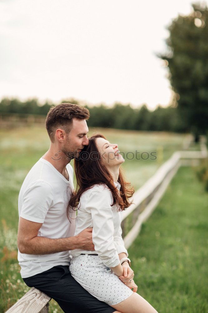 Similar – Image, Stock Photo Smiling couple of lovers having fun.
