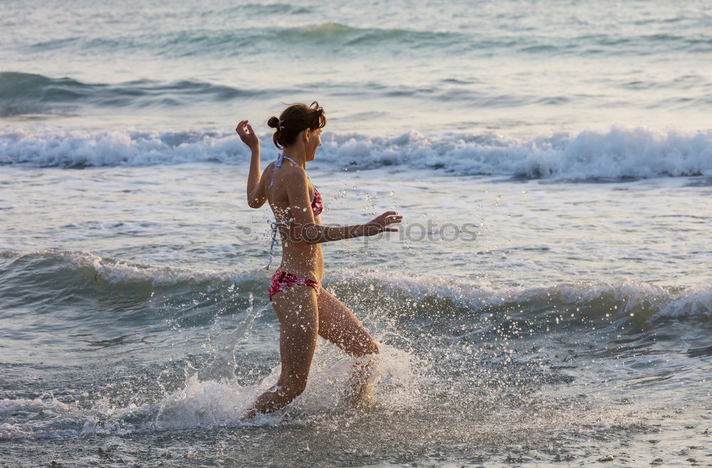 Similar – Girl at the Beach Ocean