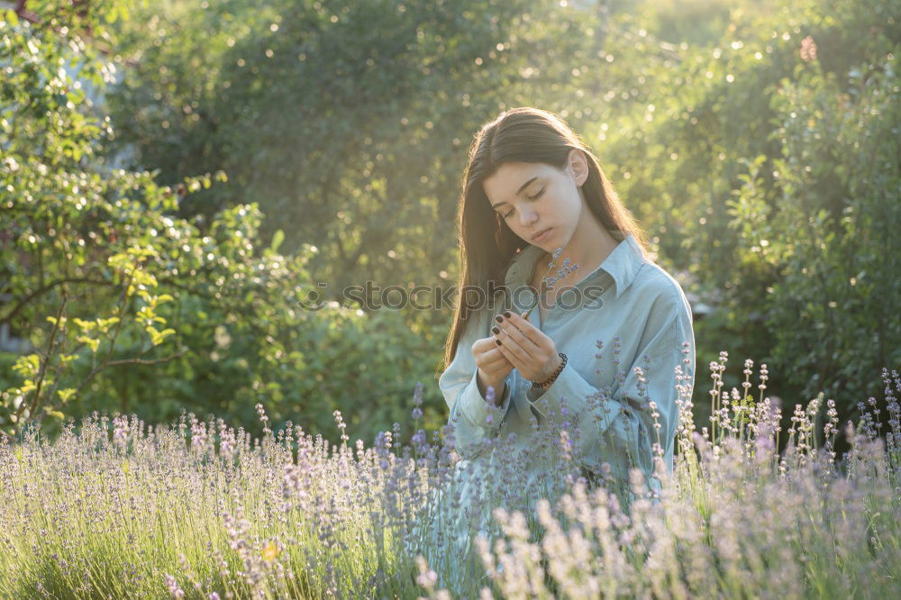 Similar – Image, Stock Photo Young woman is packing her backpack during hiking in summer nature. Concepts of adventure, extreme survival, orienteering. Equipments for hike.