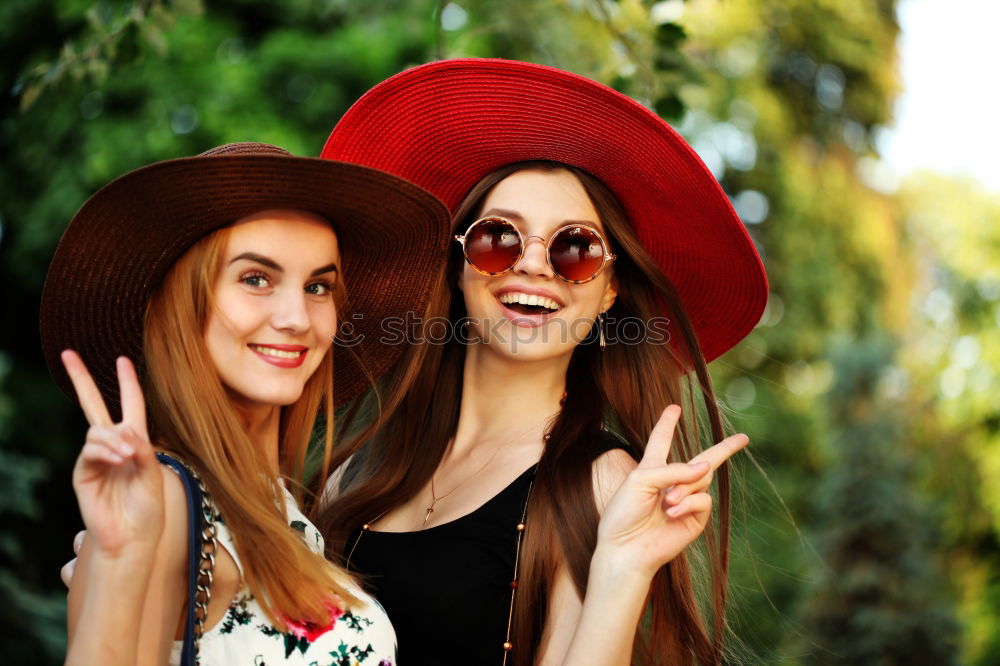 Similar – Image, Stock Photo Two girls sitting on the bench and smile