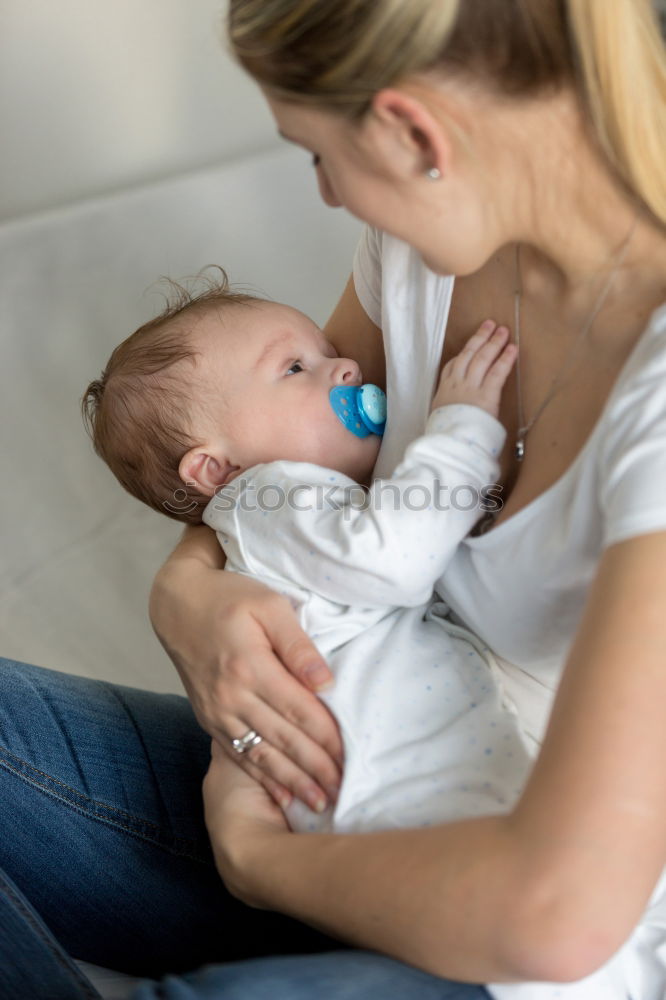 Similar – Breastfeed Feminine Child