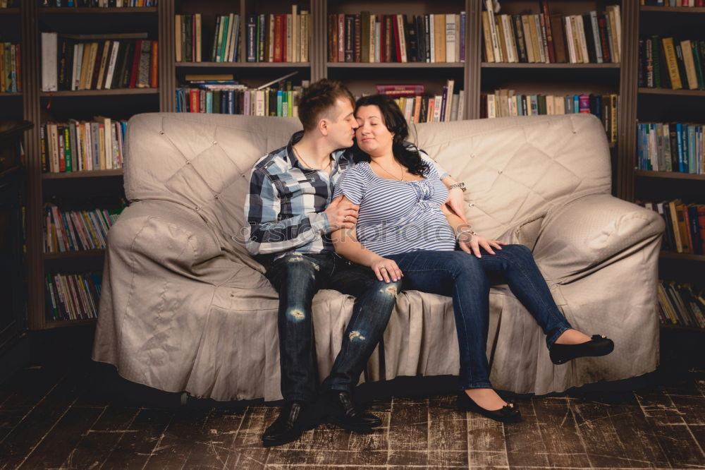 indoor portrait of happy mother comforting toddler son