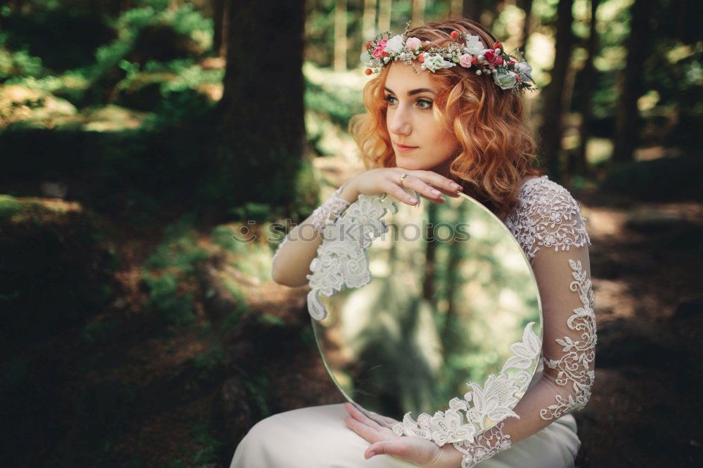 Similar – A Young Woman Standing in the Woods