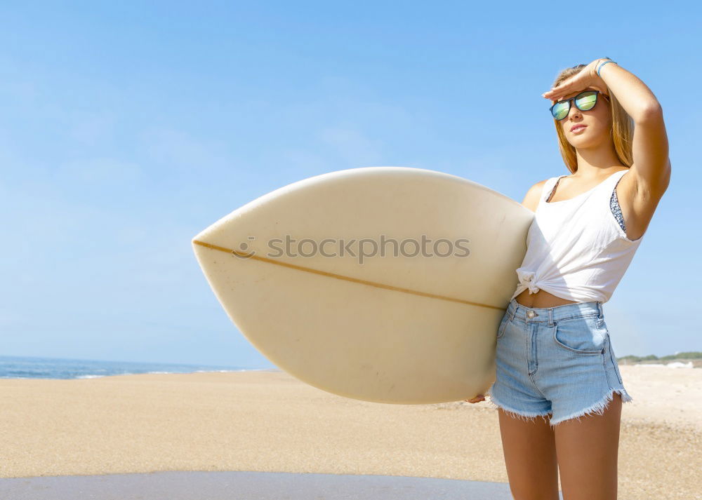 Similar – Image, Stock Photo Caucasian Girl holding surfboard on the beach