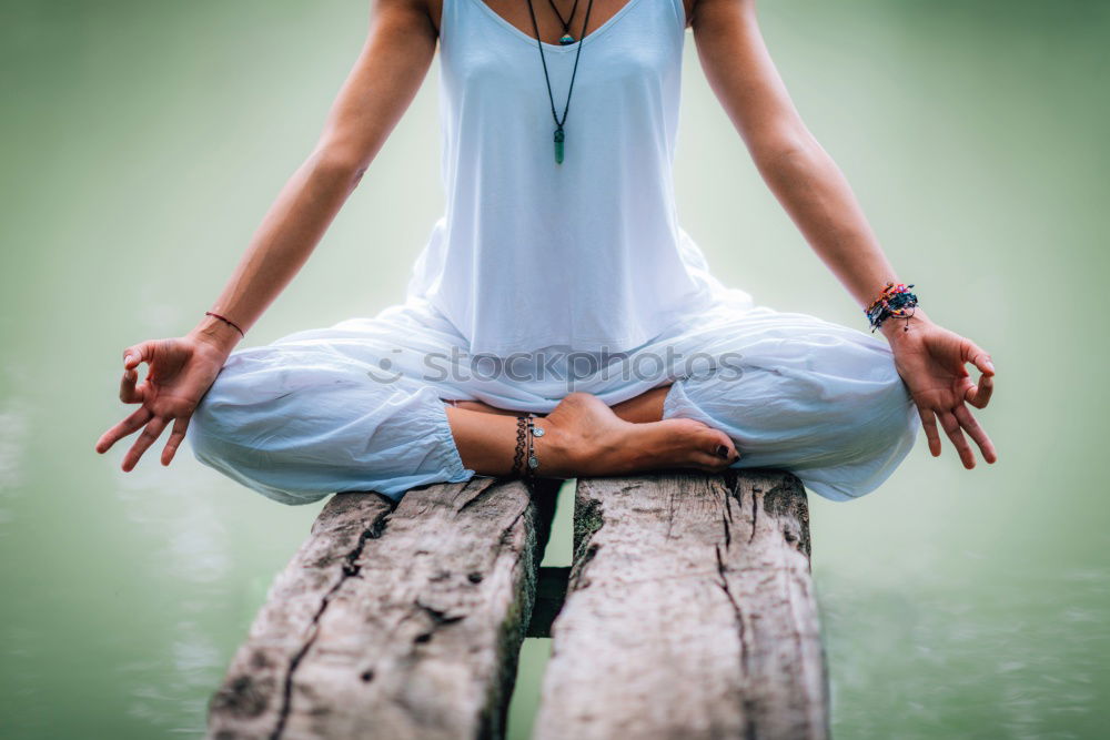 Similar – Image, Stock Photo Young woman doing yoga on wooden road in nature