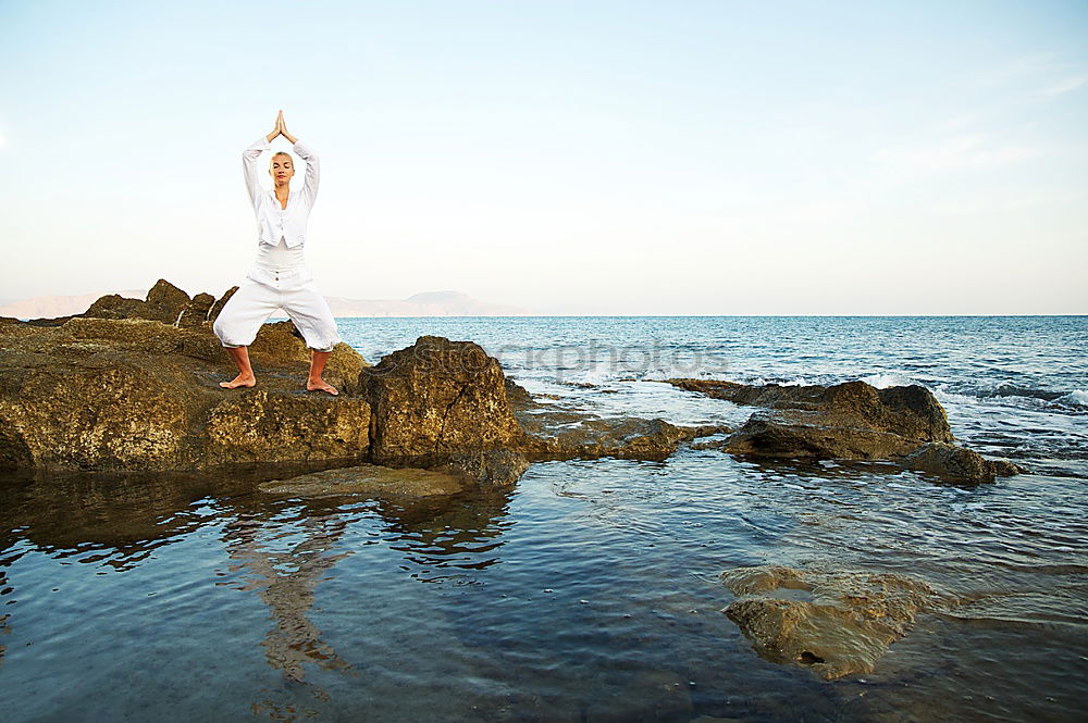 Similar – Diver in shallow water preparing to swim