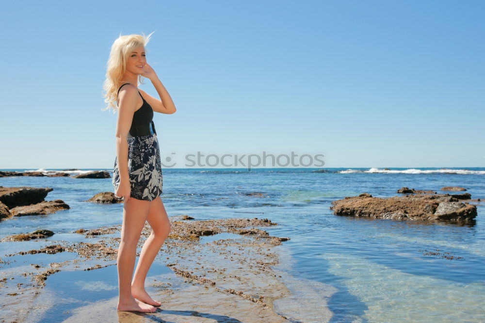 Similar – Image, Stock Photo Woman standing in the Kieler Förde with view to the side