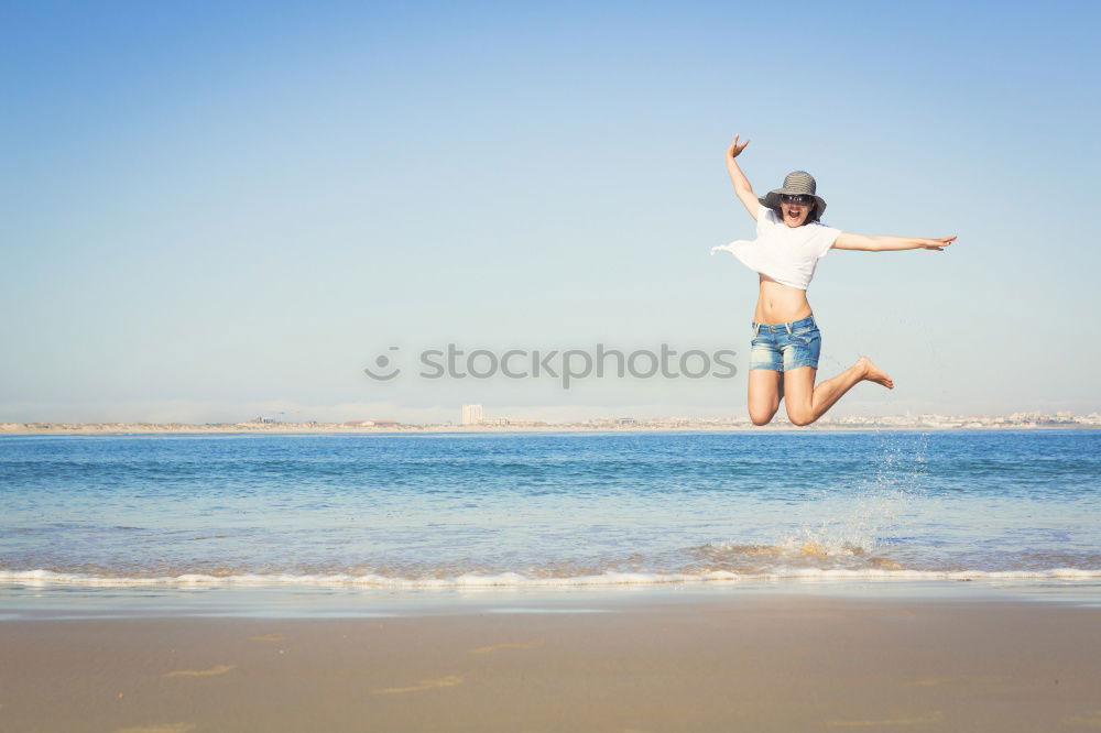 Similar – One happy little girl playing on the beach at the day time.