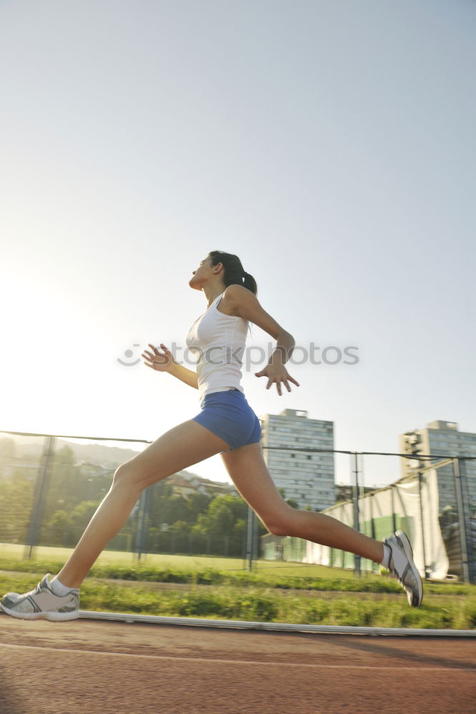 Similar – Female young athlete doing interval training on stairs