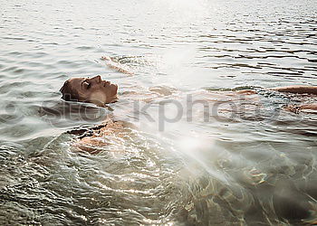 Similar – Image, Stock Photo Woman with closed eyes in water