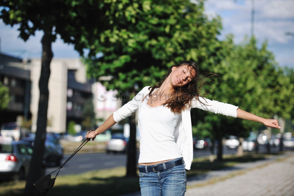 Similar – Image, Stock Photo Cheerful traveler posing at street