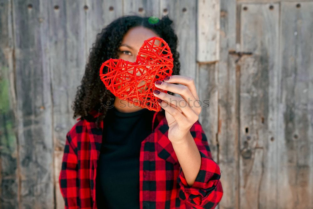 Image, Stock Photo Beautiful young woman holding a red heart