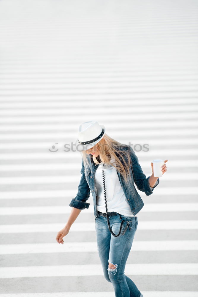 Similar – Image, Stock Photo Beautiful young mulatto woman in urban environment