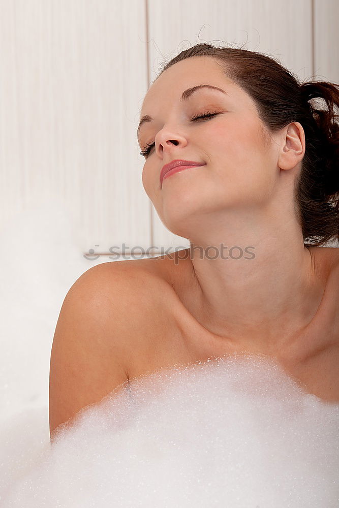 Similar – Image, Stock Photo Woman lying in tub doing hydrotherapy treatment