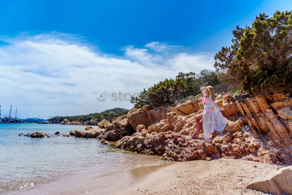 Similar – Image, Stock Photo Mother and little daughter having fun on the beach of the Wall of Puerto Sherry