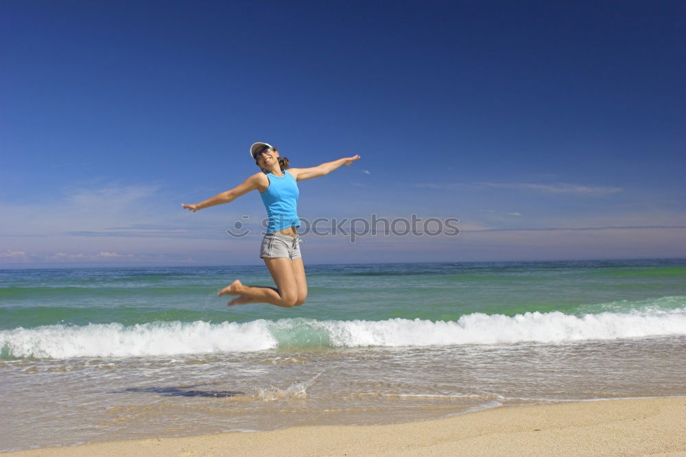 Similar – One happy little girl playing on the beach at the day time.