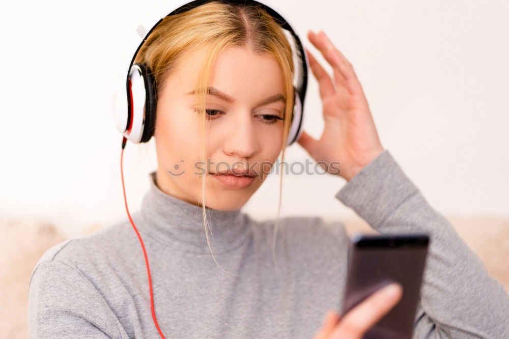 Similar – Image, Stock Photo young woman listening to music with wireless bluetooth headphones and mobile smart phone